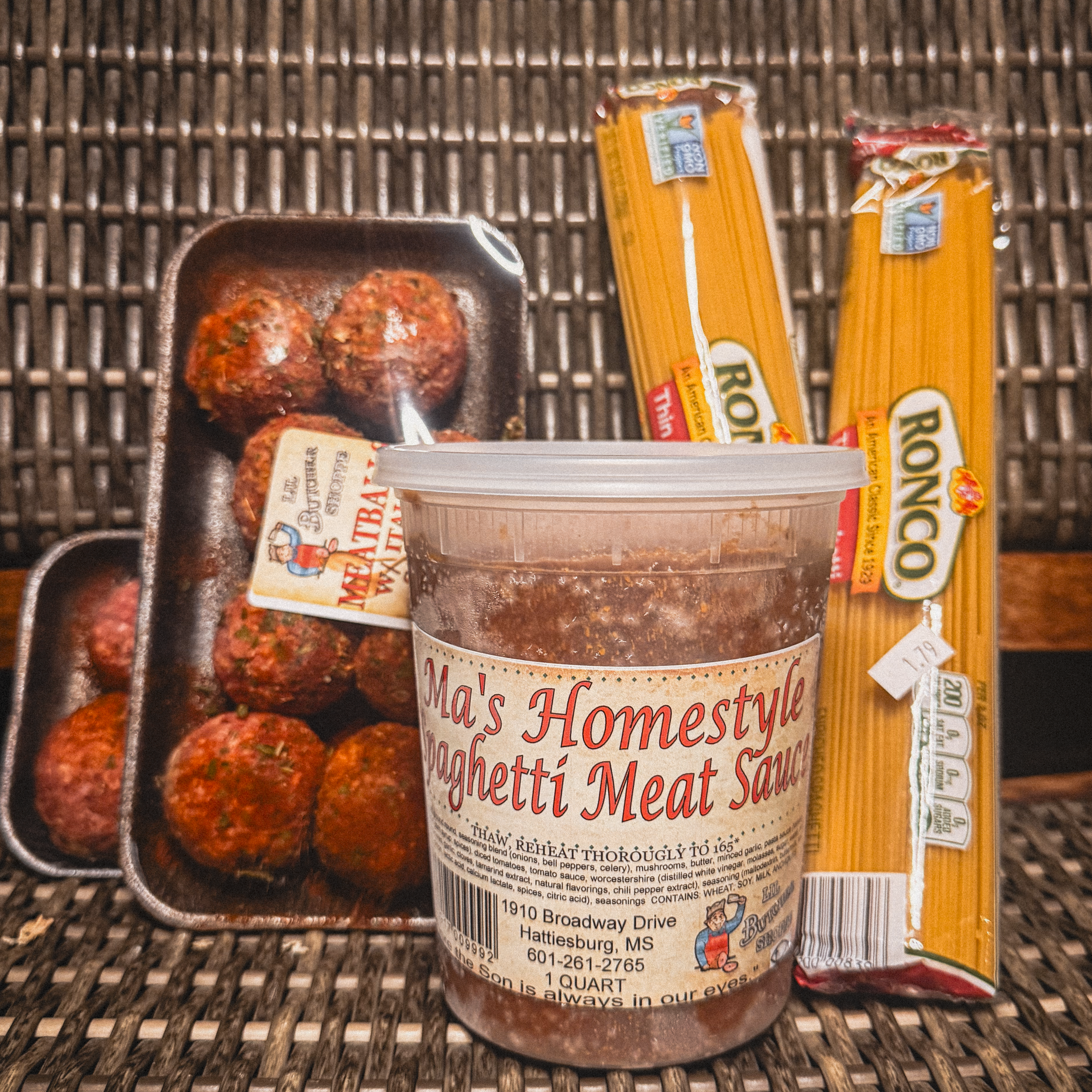 Lil Butcher Shoppe meatballs, a quart of Ma's Homestyle Spaghetti Meat Sauce and two packs of spaghetti